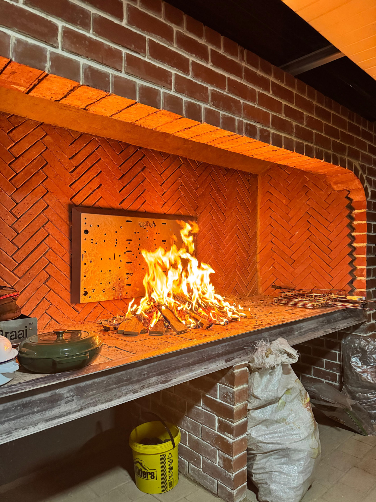 Custom-built brick braai with herringbone brickwork