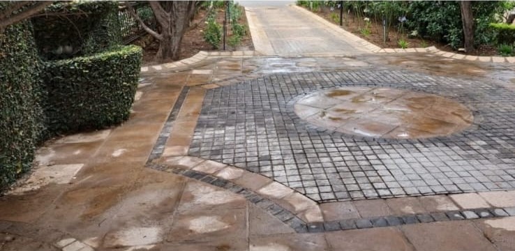 Decorative driveway paving with cobble inlay